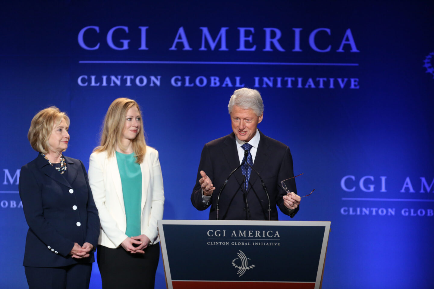 President Clinton, Secretary Clinton, and Chelsea Clinton speak onstage at CGI America