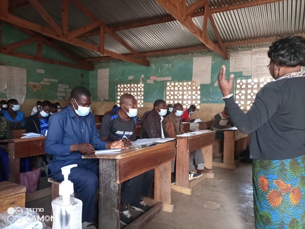 A group of farmers getting trained in cooperative formation and management in Malawi