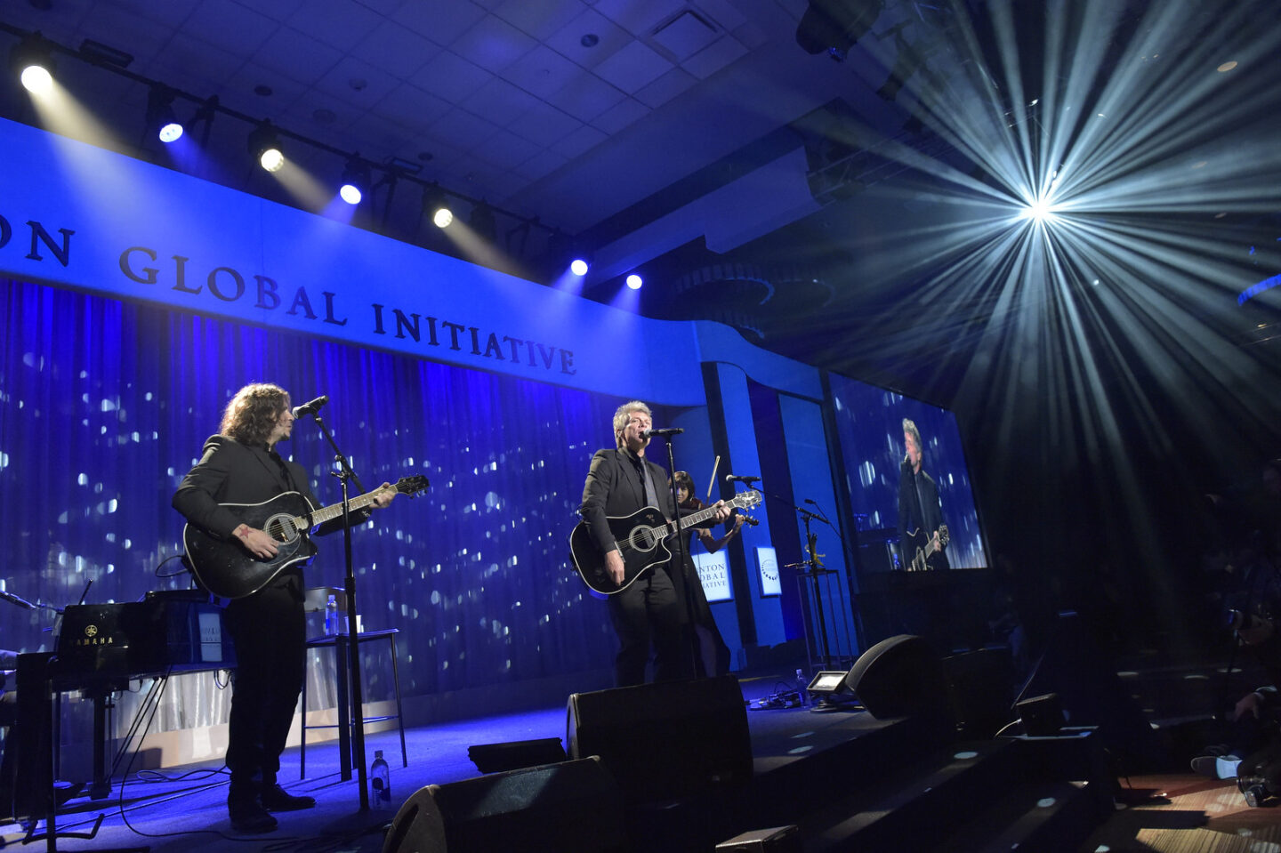 Jon Bon Jovi performs on stage at the Clinton Global Citizen Awards