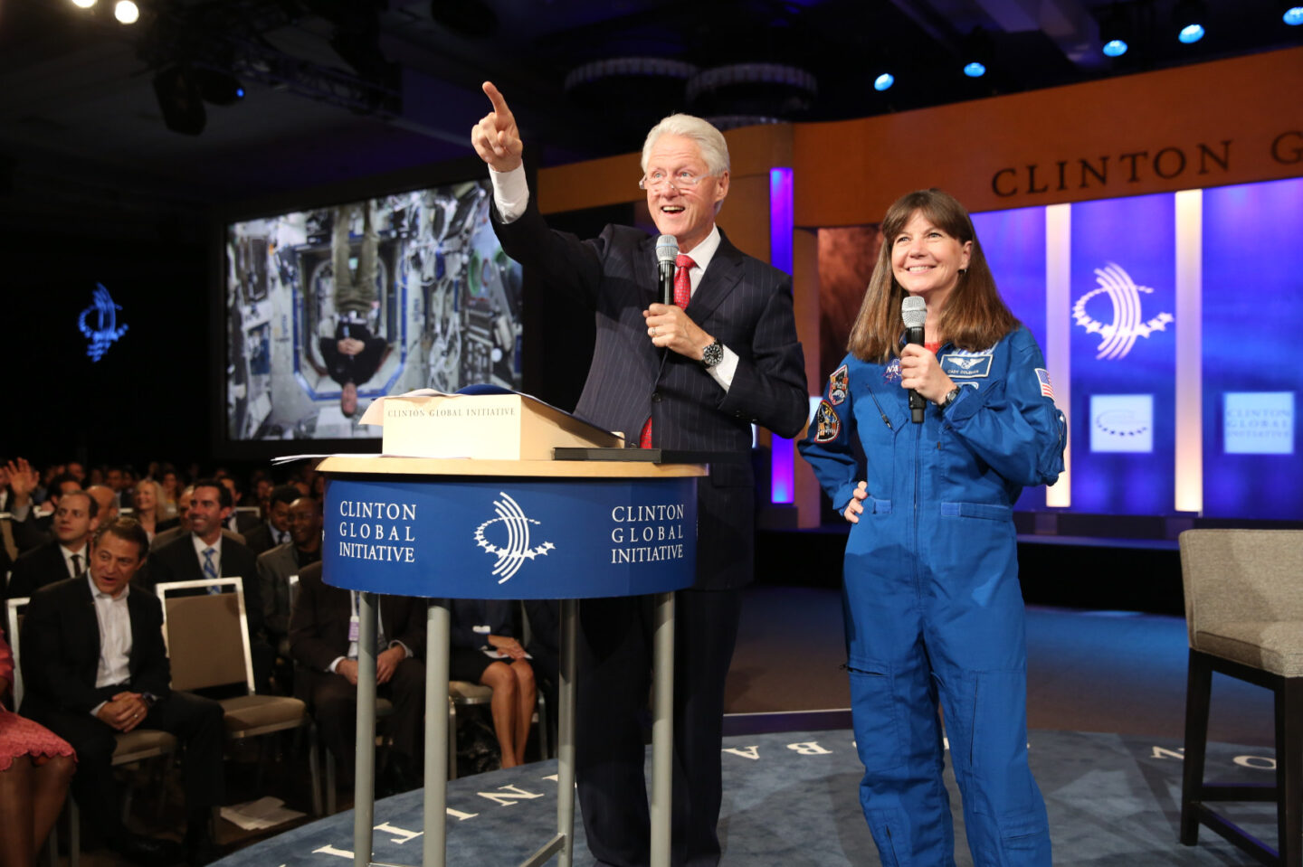 President Clinton and Astronaut Cady Coleman speak with Astronauts Reid Wiseman and Alex Gerst on the International Space Station