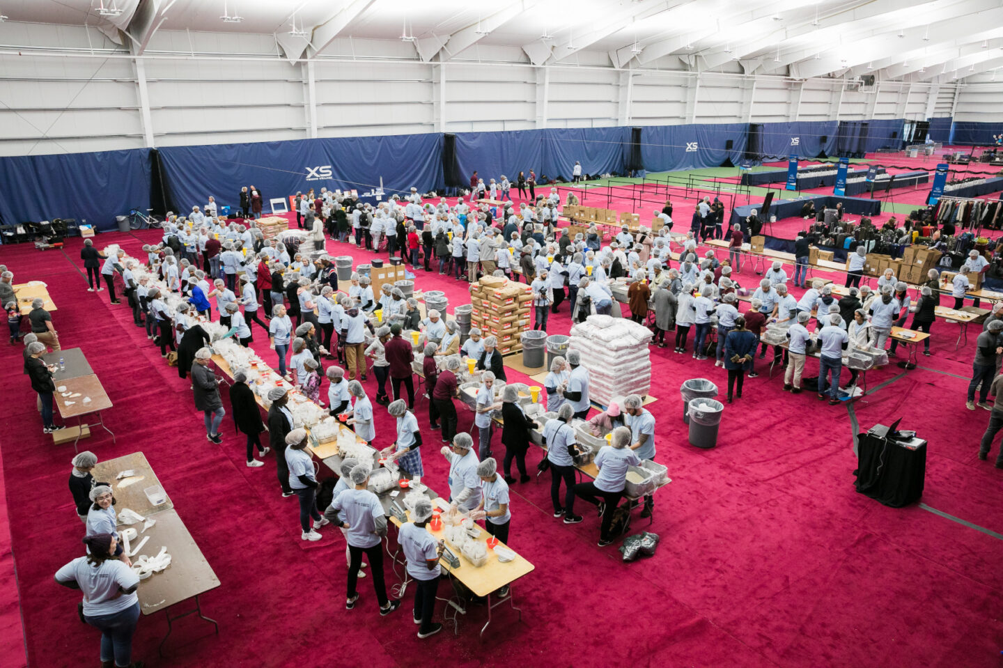 Students and volunteers help pack food during a Day of Action in Chicago