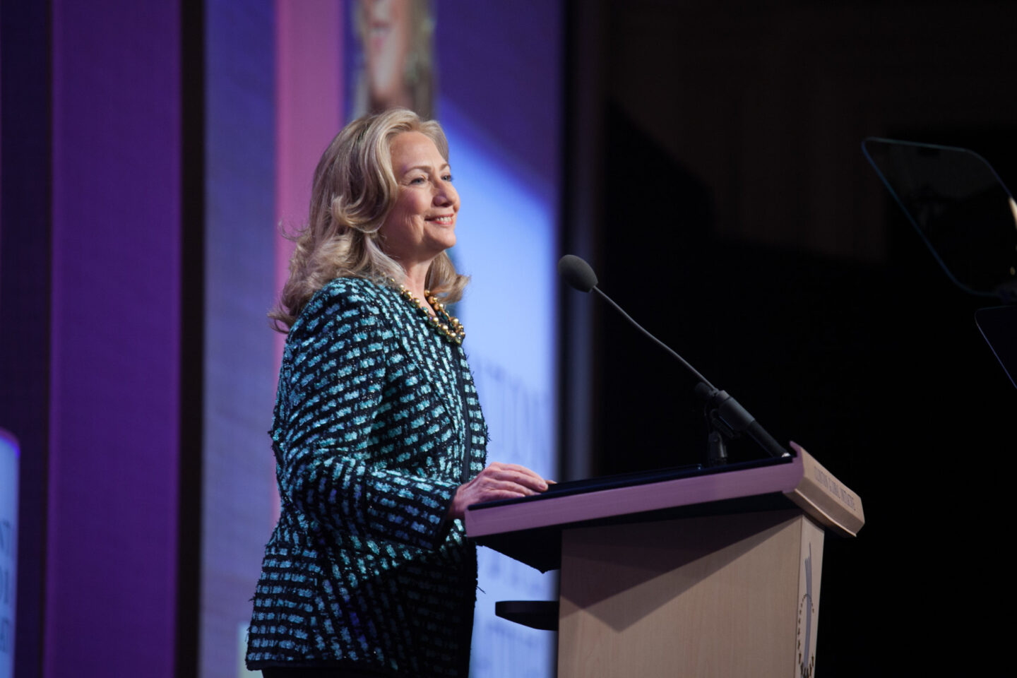 Secretary Hillary Clinton speaks on stage