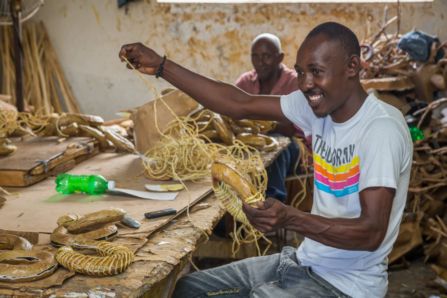 An individual puts together artisanal pieces