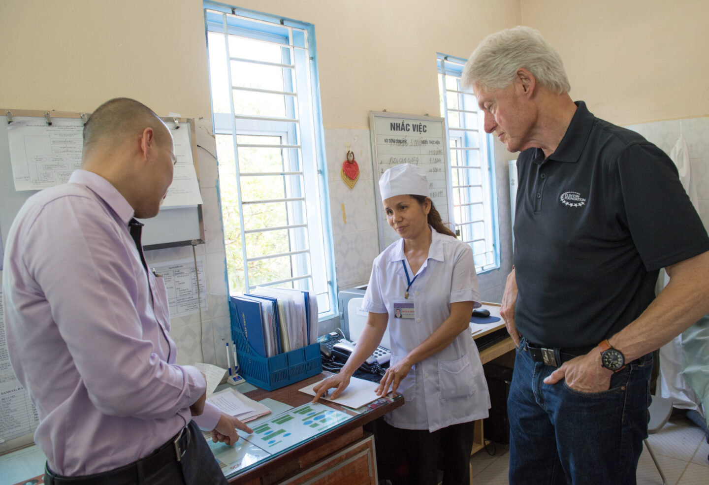 President Clinton meets with individuals at an orphanage in Hanoi, Vietnam