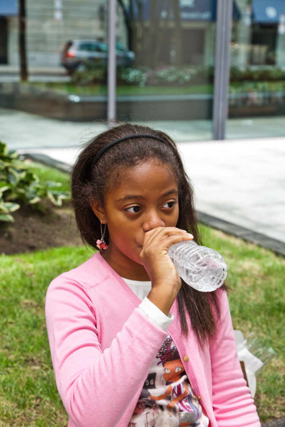 A student takes a drink of water