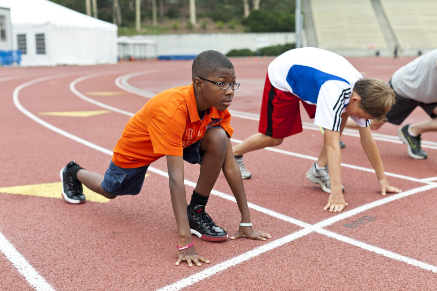 Students get ready to run around a track