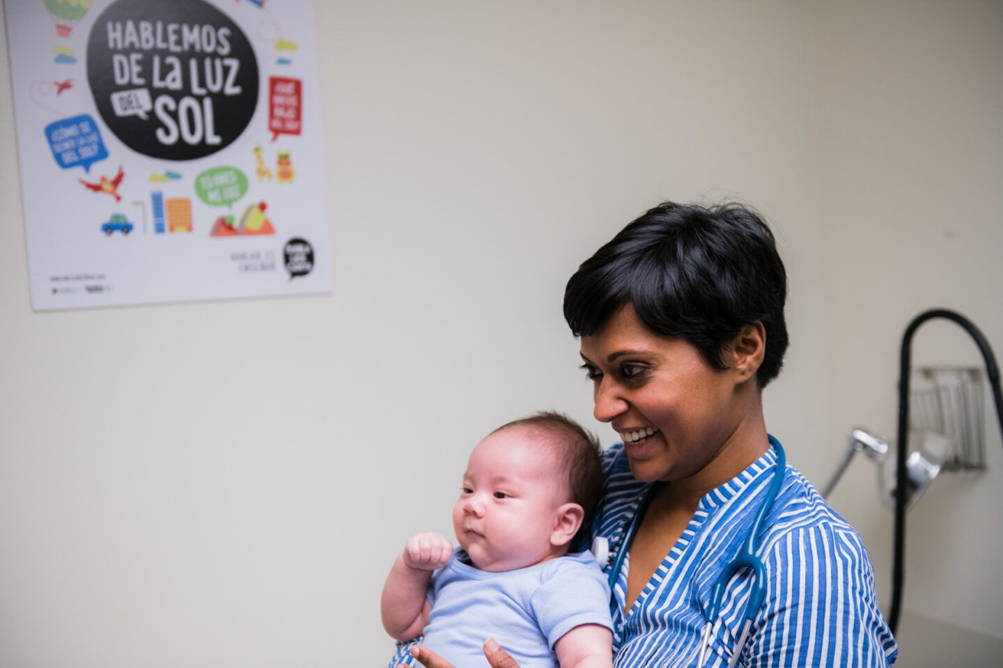 Dr. Neeti Doshi holds an infant