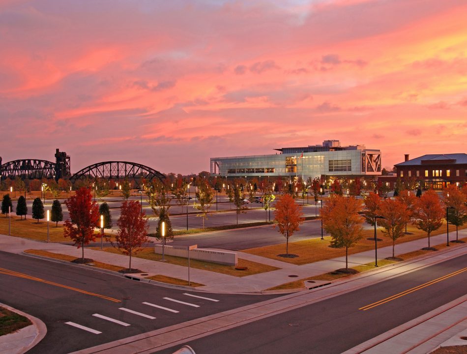 An exterior shot of the Clinton Presidential Center at sunset