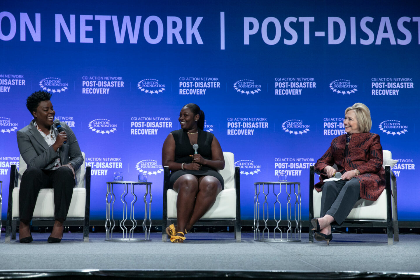 Secretary Clinton moderates a panel discussion in Puerto Rico