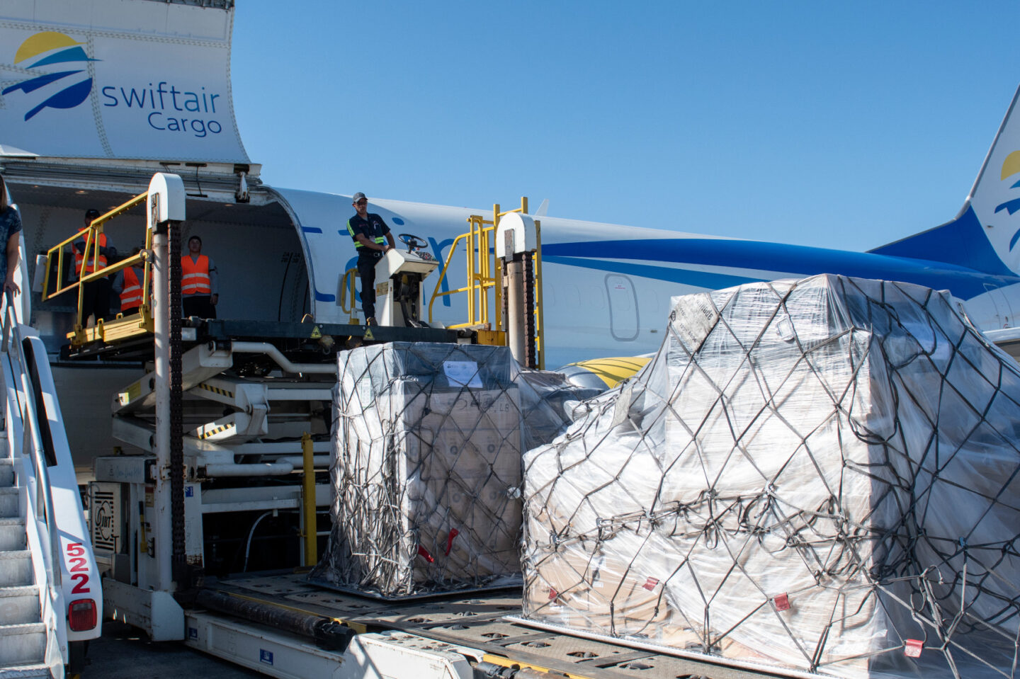 Medical supplies and equipment being offloaded from an airplane in Puerto Rico