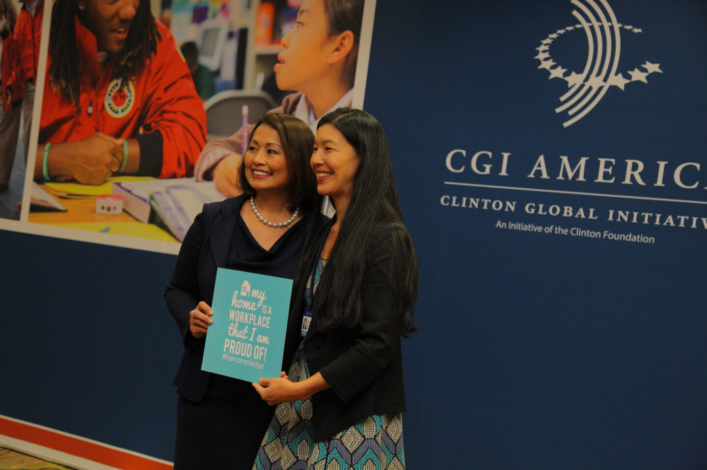 Two women take a photo at CGI America