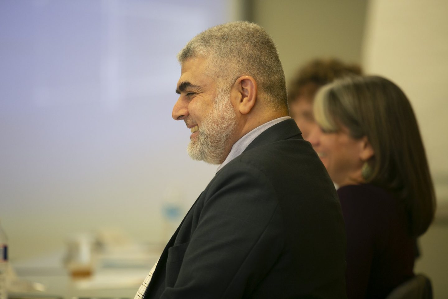 An individual is pictured in profile
