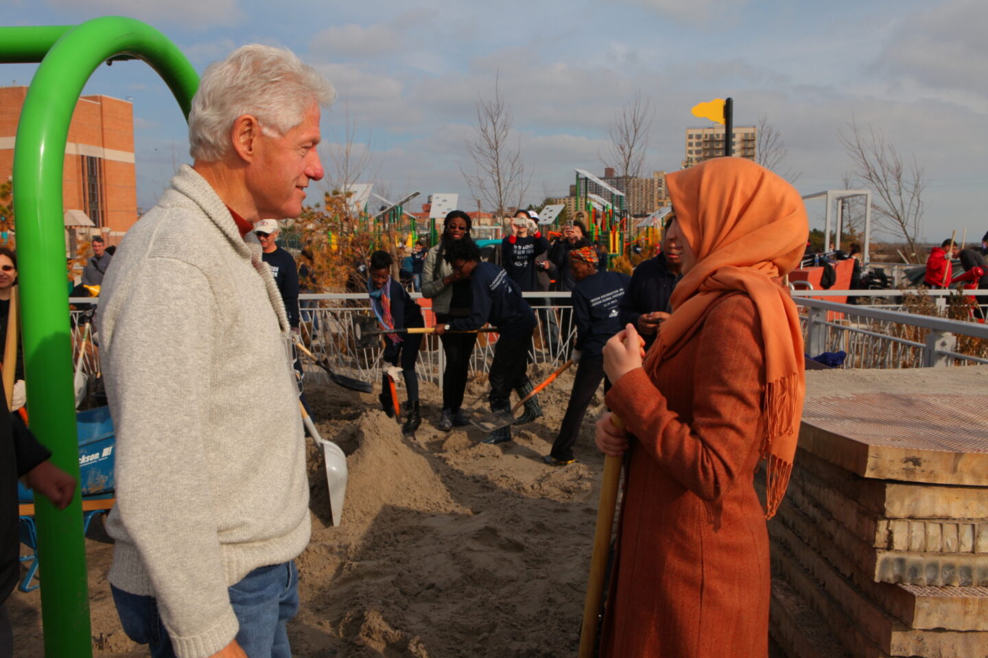 President Clinton and volunteers on a playground