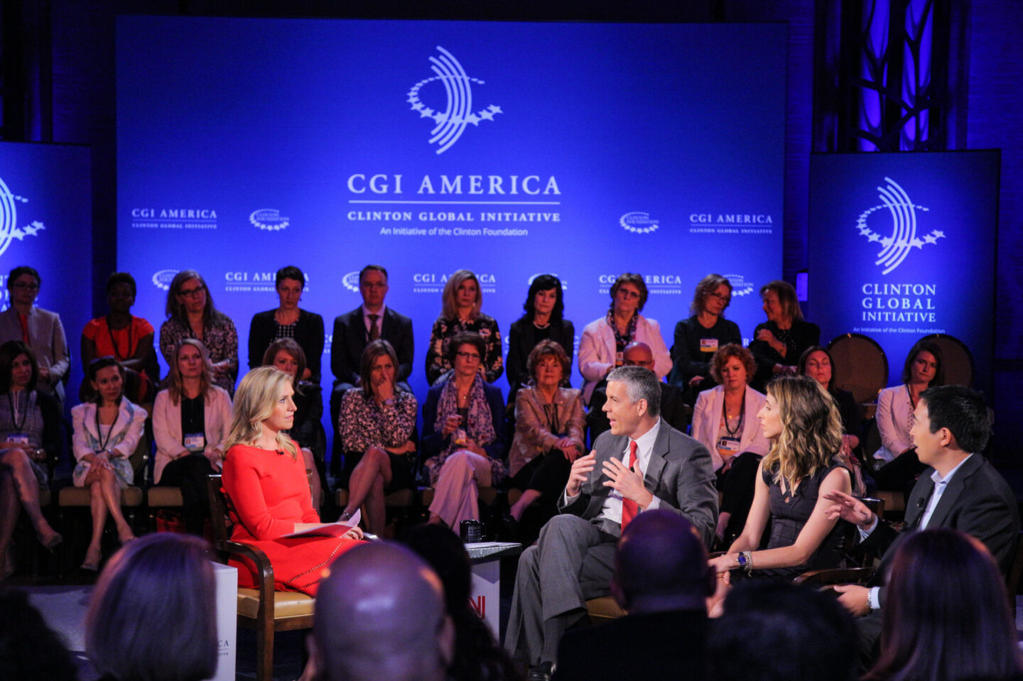 Poppy Harlow, Arne Duncan, Katia Beauchamp, and Andrew Yang participate in a panel discussion