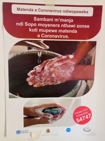 Poster with public health information about coronavirus and hand washing