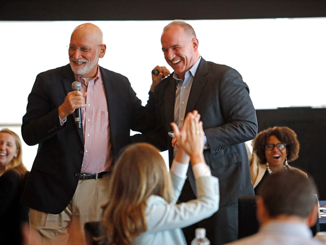 Dr. Mike Hemphill speaks into a microphone