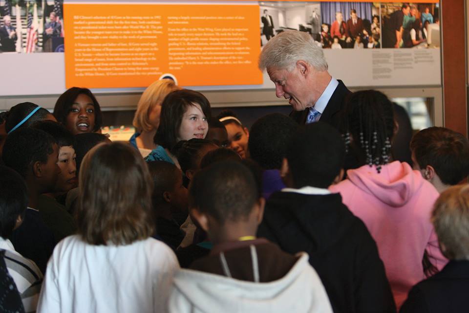 President Clinton speaks with a group of students
