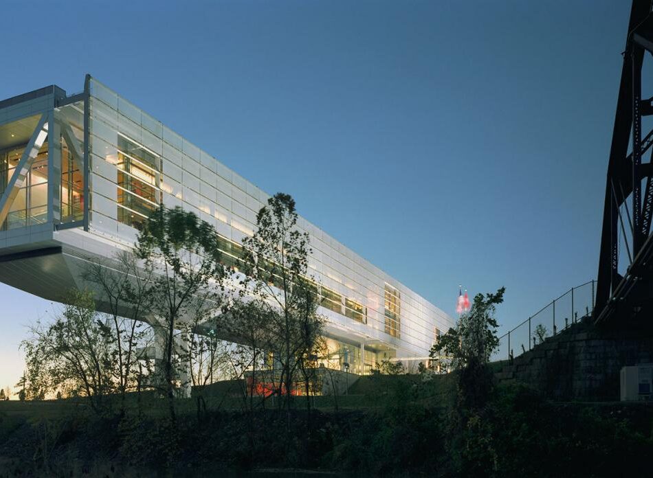 Exterior of the Clinton Presidential Center building at dusk