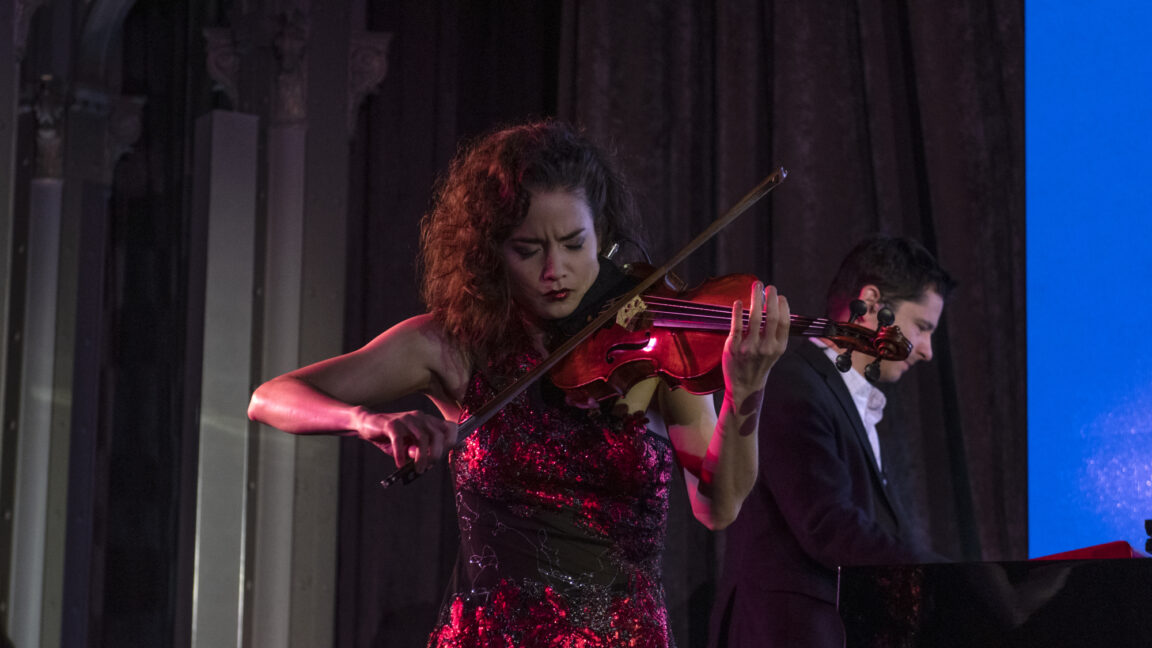 A musician plays a violin