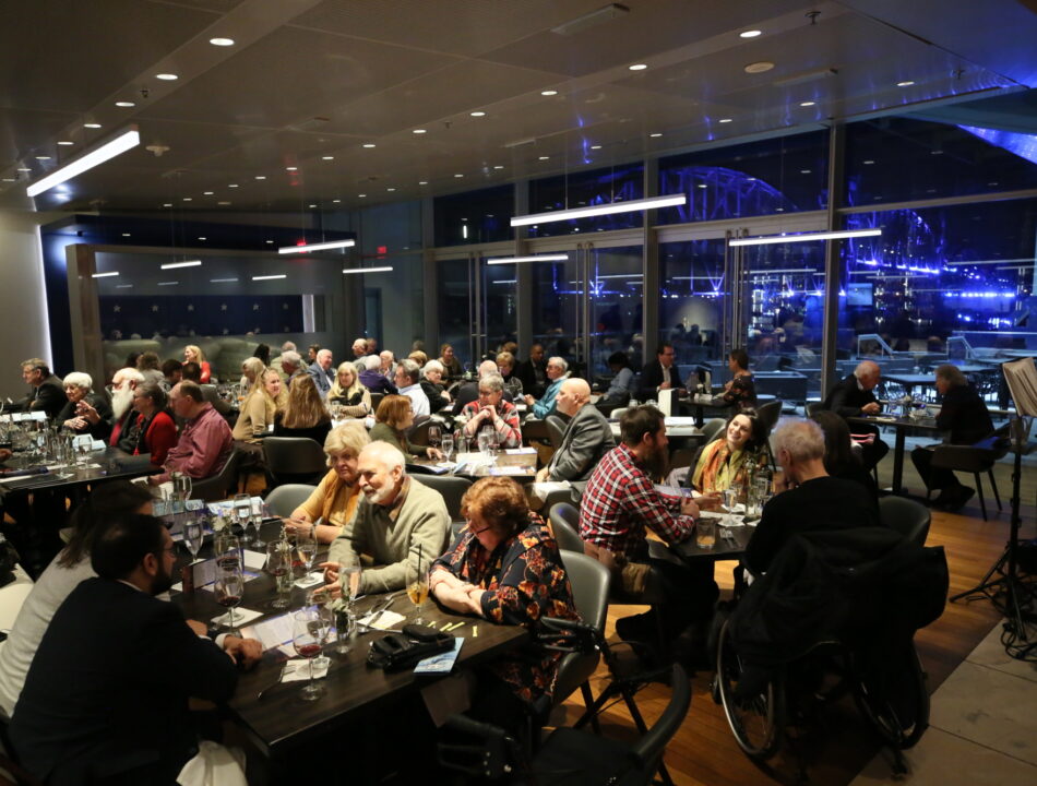 42 bar and table filled with guests