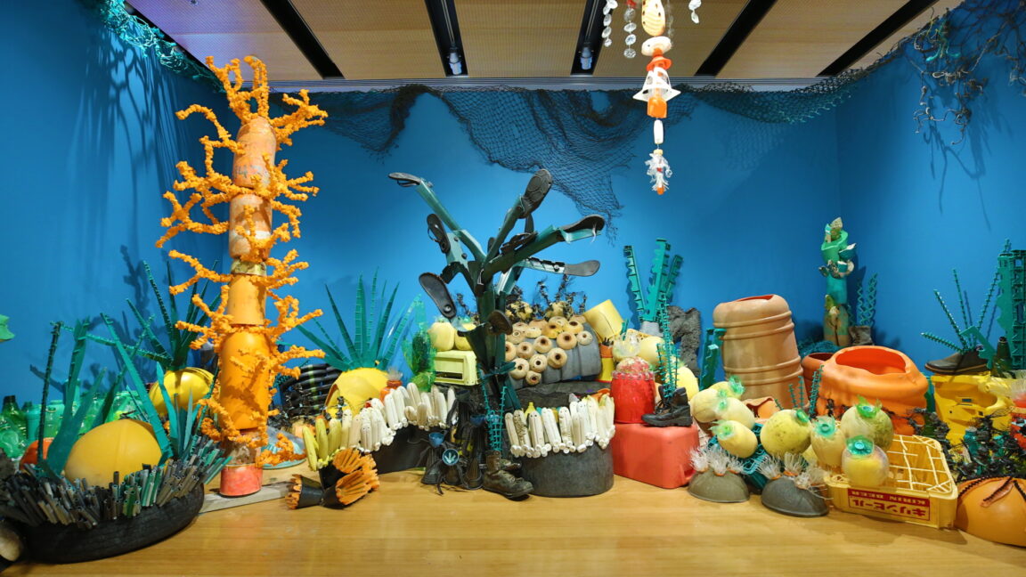 Exhibit built from repurposed materials designed to look like a sea floor