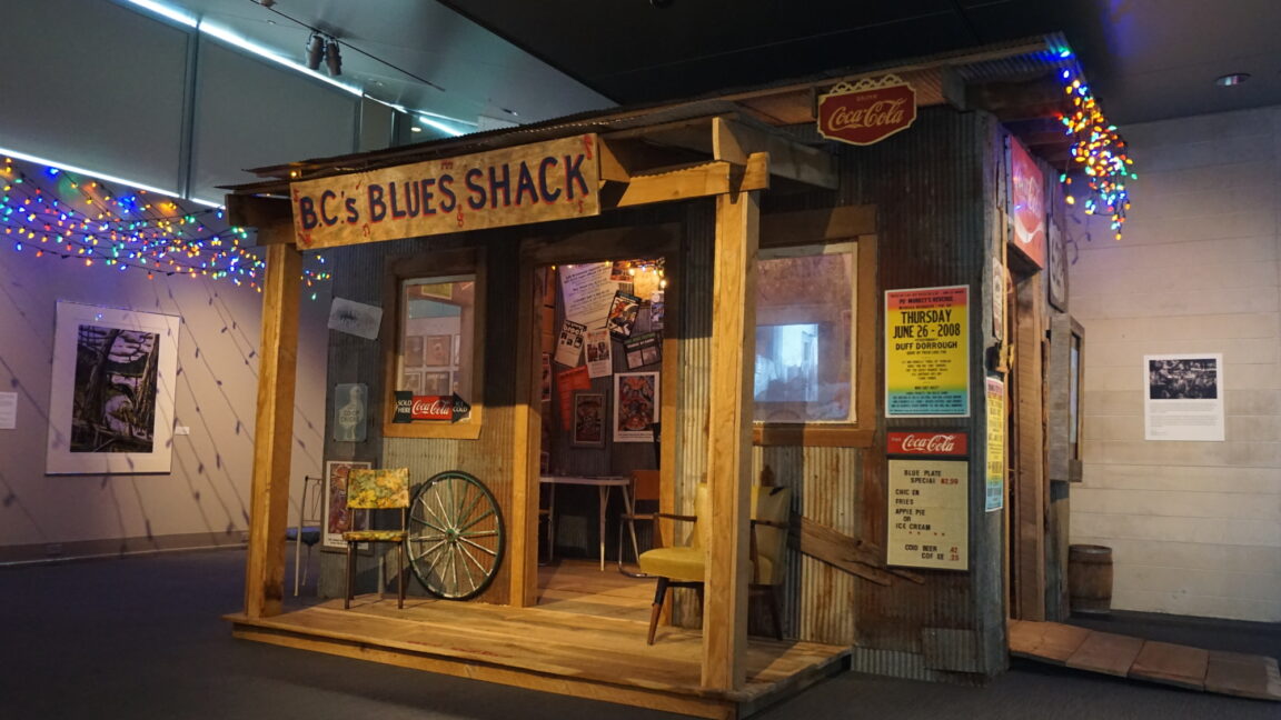 Exhibit which includes a walk-in juke joint. A sign above it says "B.C.'s Blues Shack."