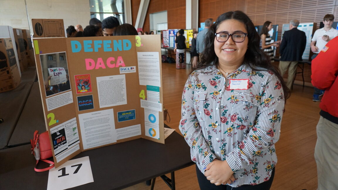 A high school student presents a project during the Clinton Center's Civics Capstone Program.