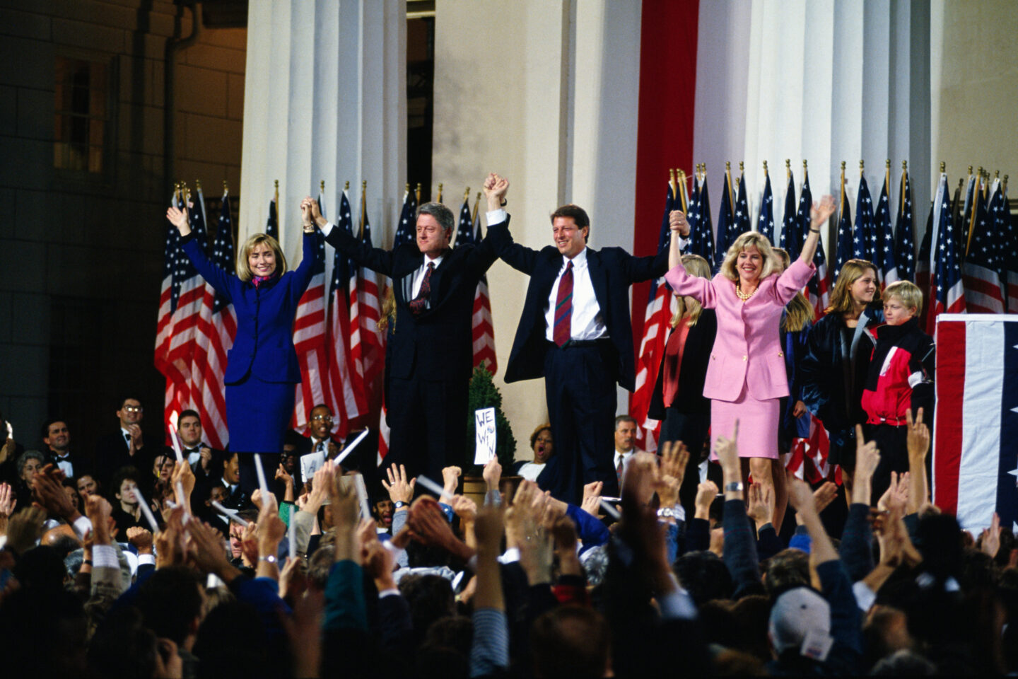 President-elect Bill Clinton and Vice President-elect Al Gore celebrate on stage.
