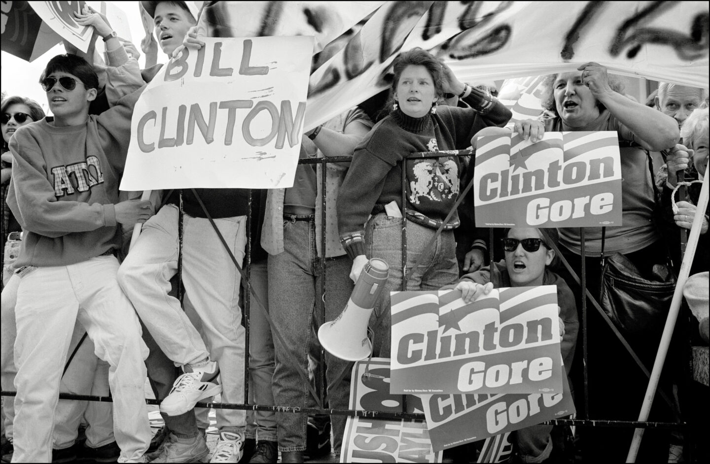 Supporters for Then-Governor Clinton and Senator Al Gore cheer during a campaign stop.