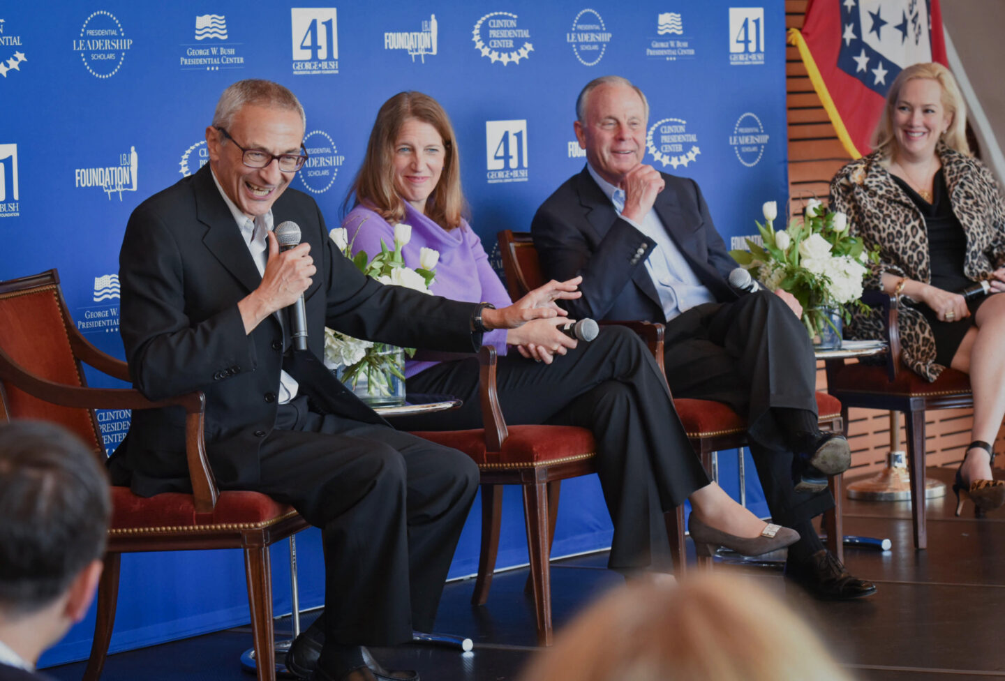 John Podesta, Sylvia Matthews Burwell, Mack McLarty, and Stephanie Streett participate in a panel discussion.