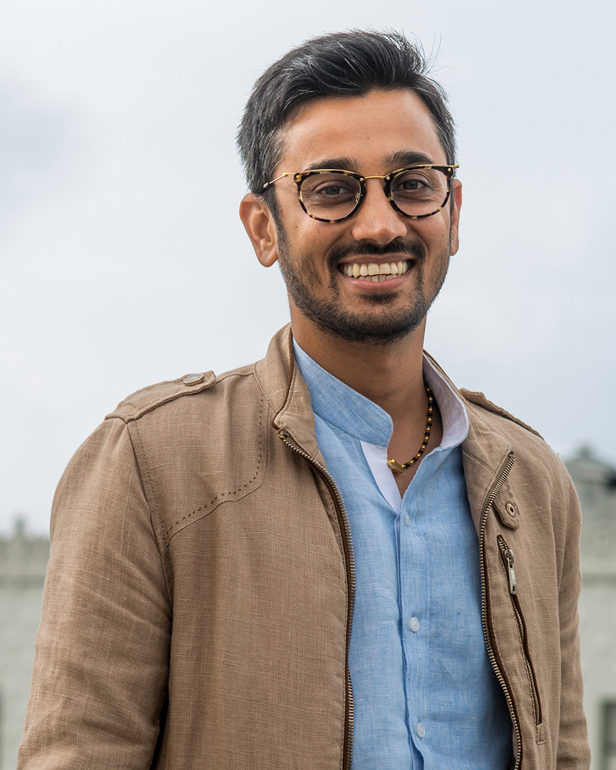 A headshot of Dr. Neil Buddy Shah, Chief Executive Officer of the Clinton Health Access Initiative