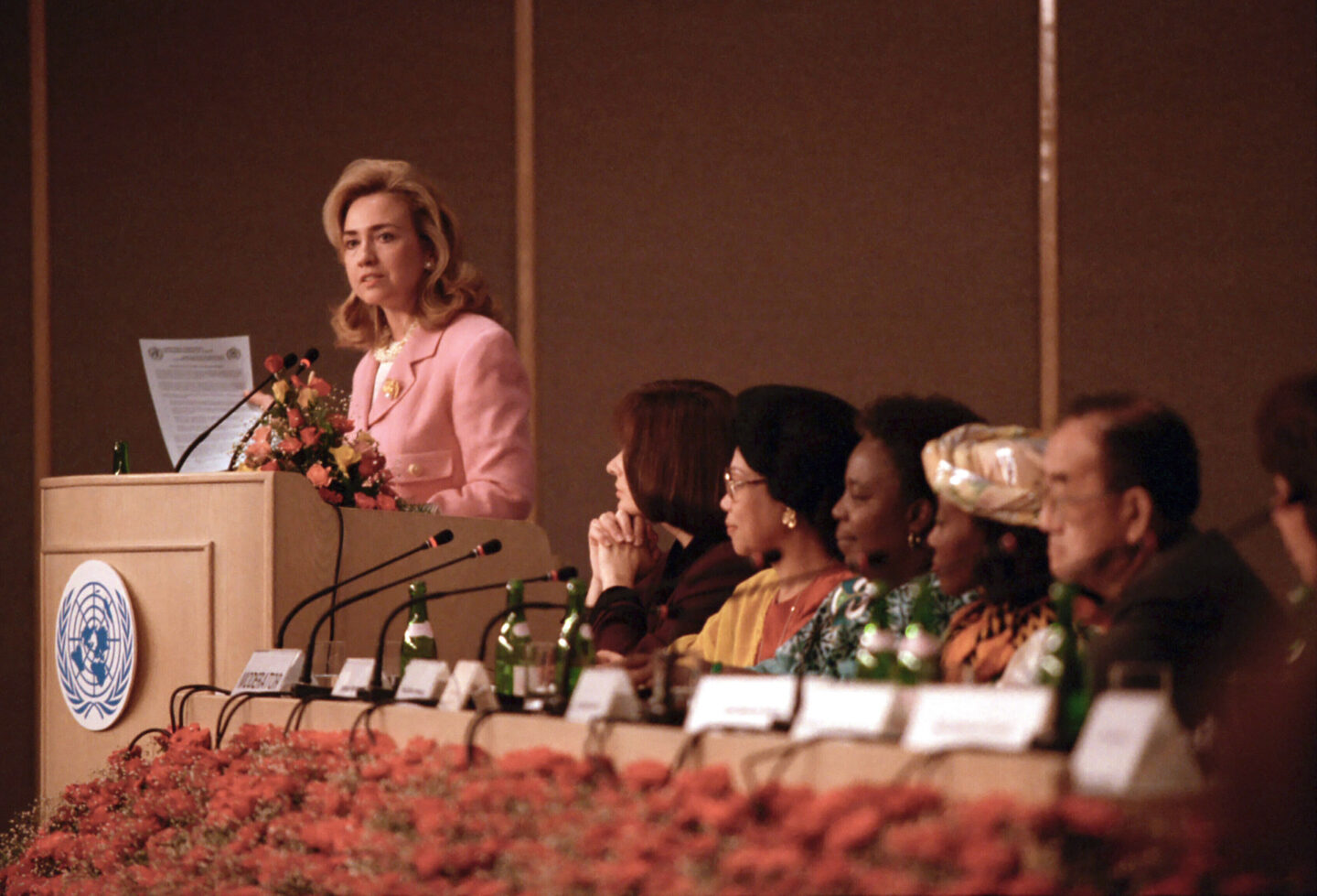 Hillary Clinton speaks behind a podium