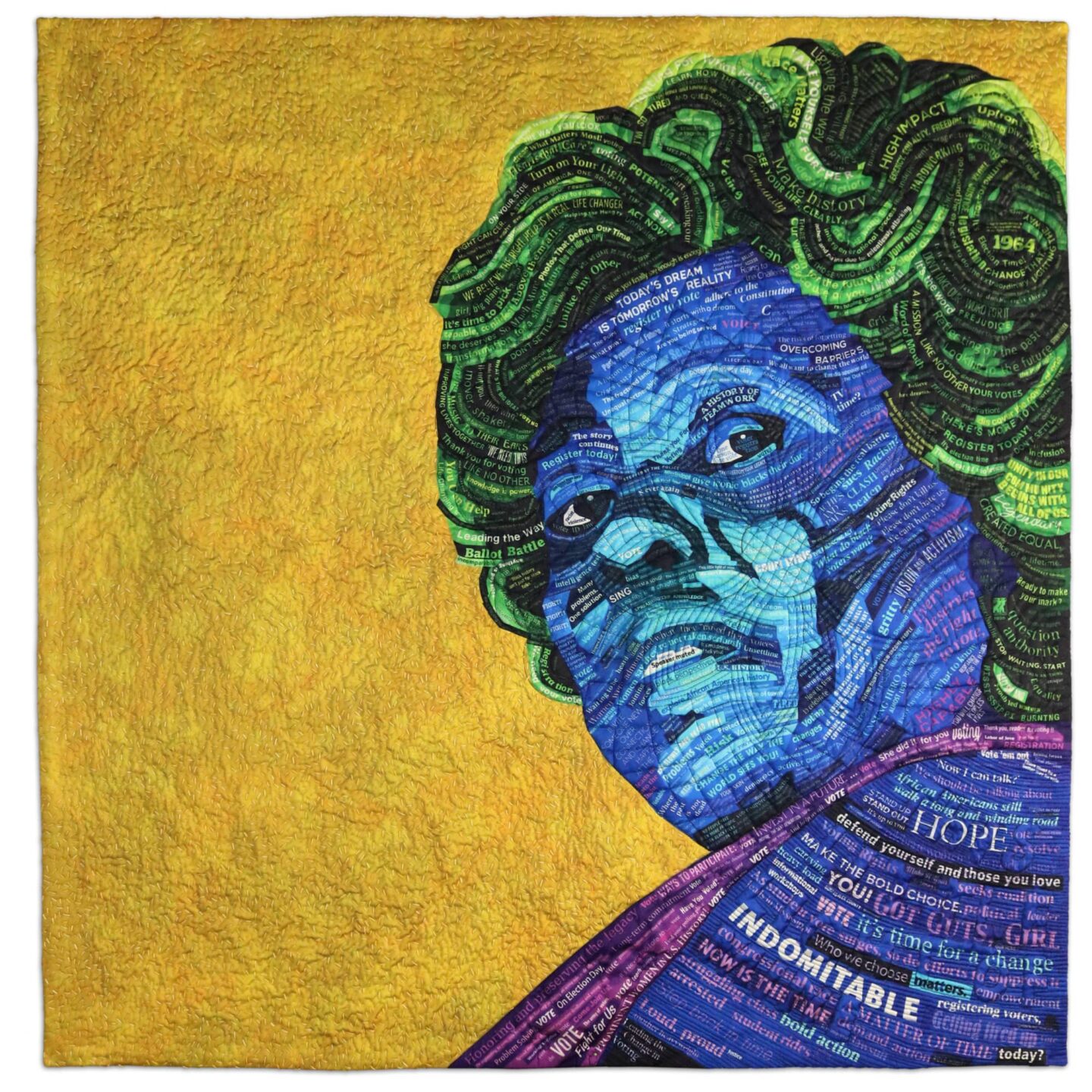 Close-up of a quilt which features a women's face