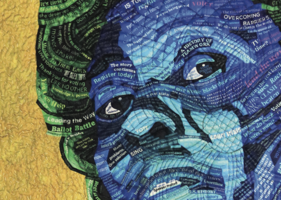 Close-up of a quilt featuring a woman's face