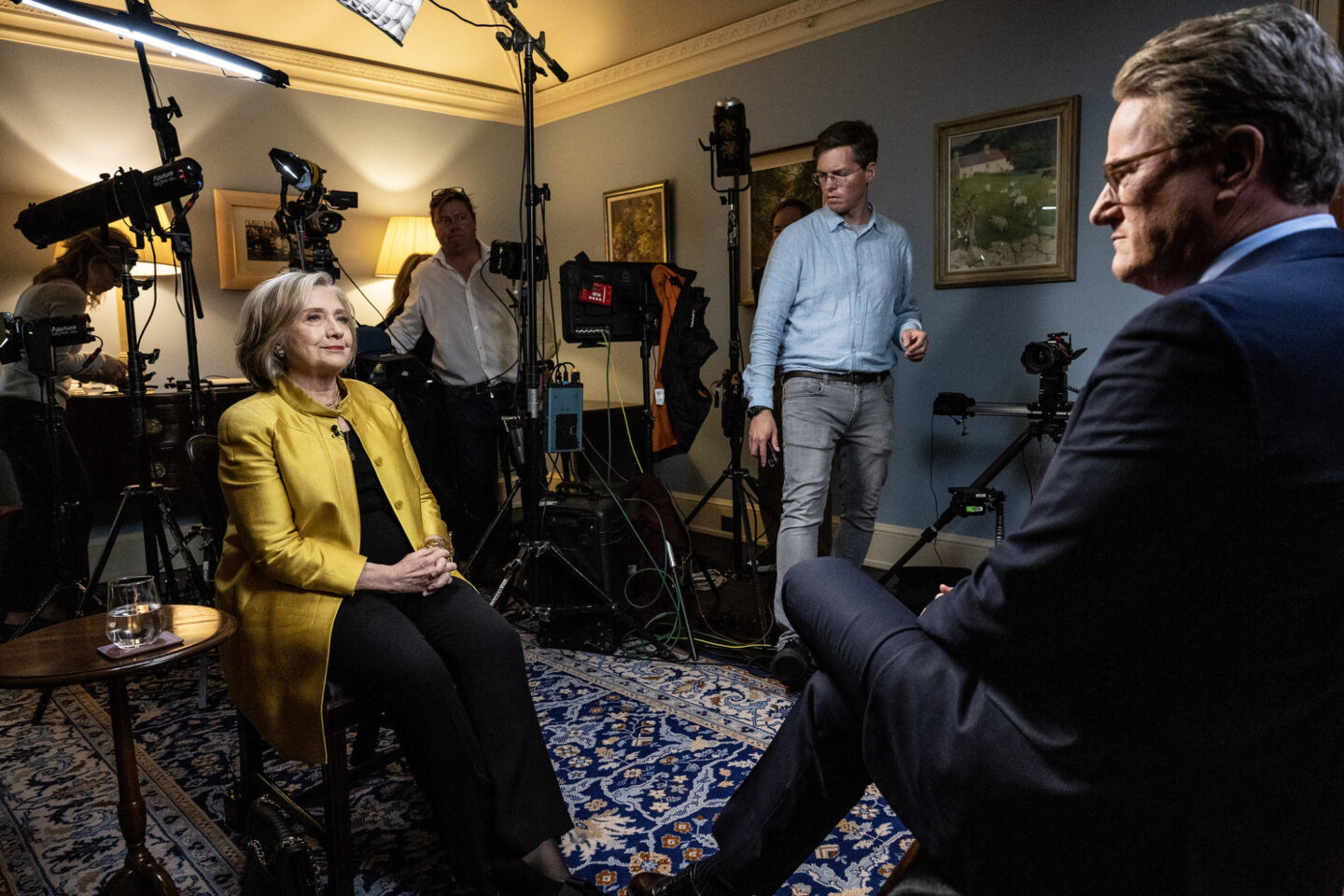 Secretary Clinton sits during a media interview