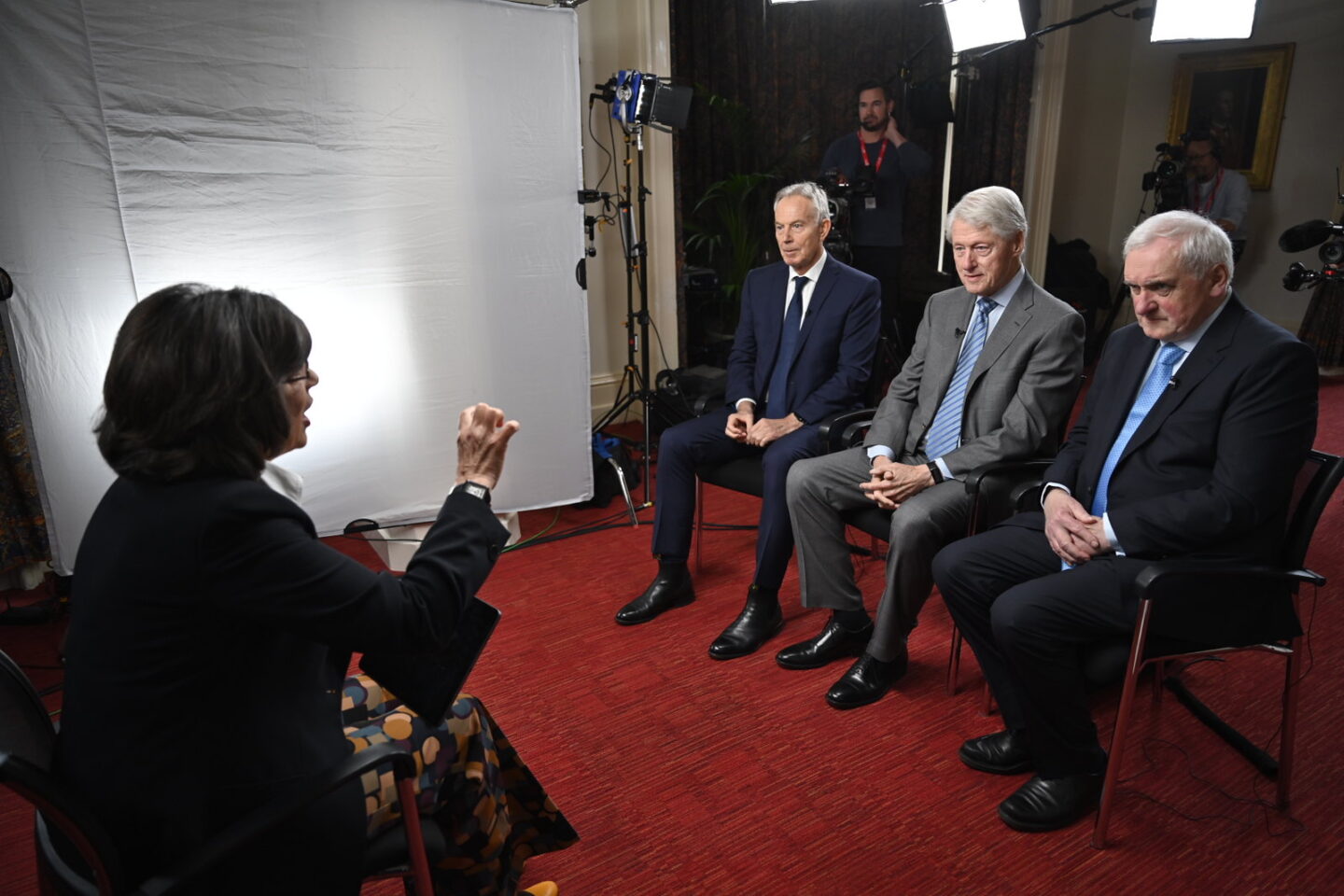 Prime Minister Tony Blair, President Bill Clinton, and Irish Taoiseach Bertie Ahern speak with Christane Amanpour