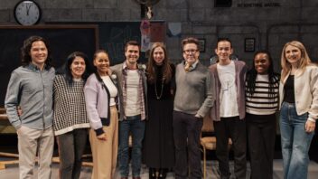 Photo of Dr. Chelsea Clinton standing with the cast of The White Chip play