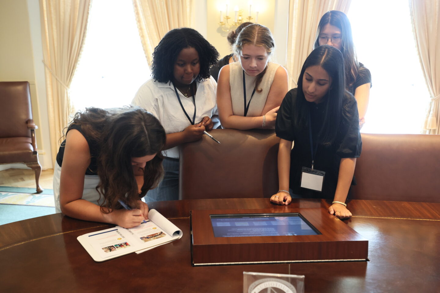 Students in the Cabinet Room inside the Clinton Center